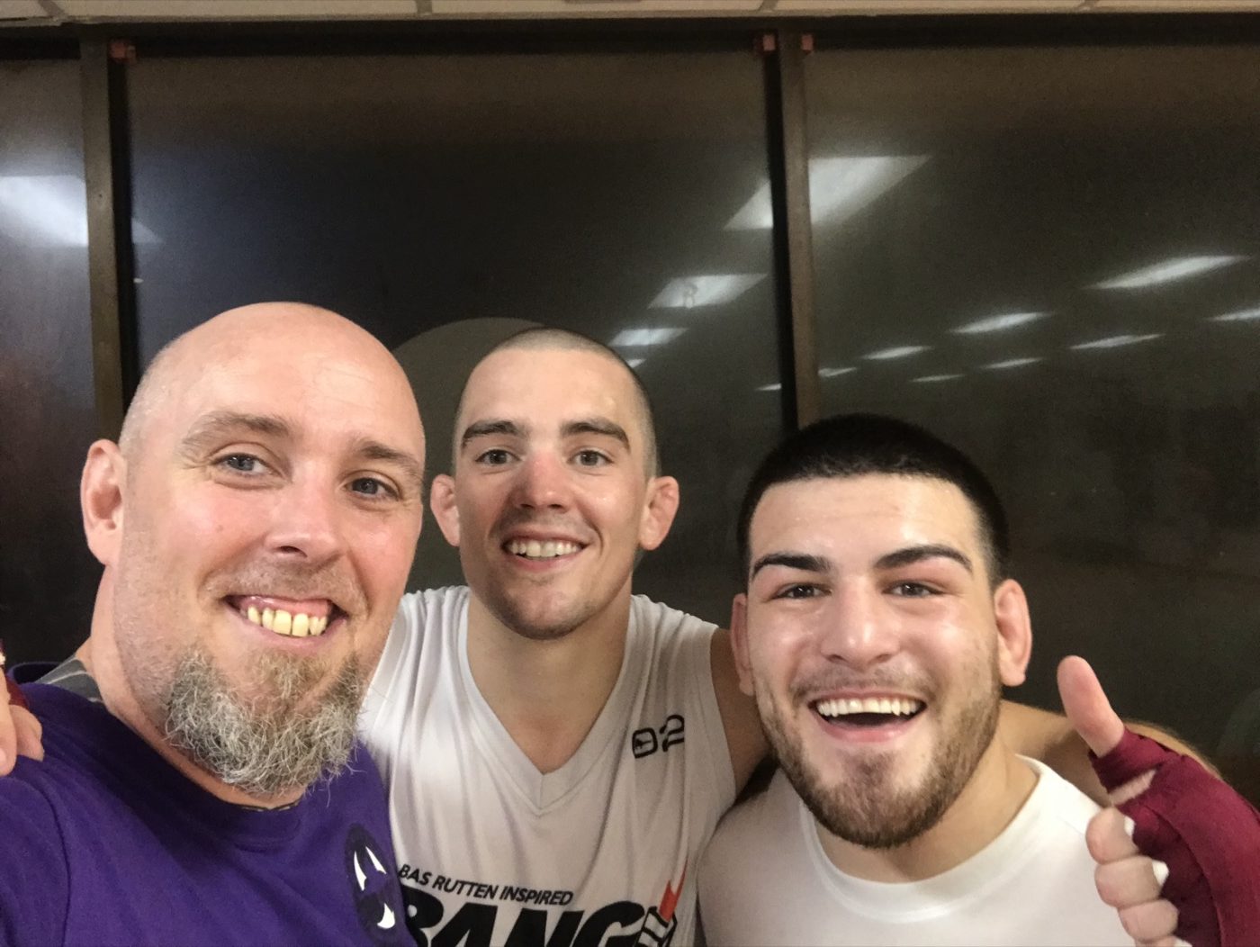 Coach Seth Stacey with a fighter