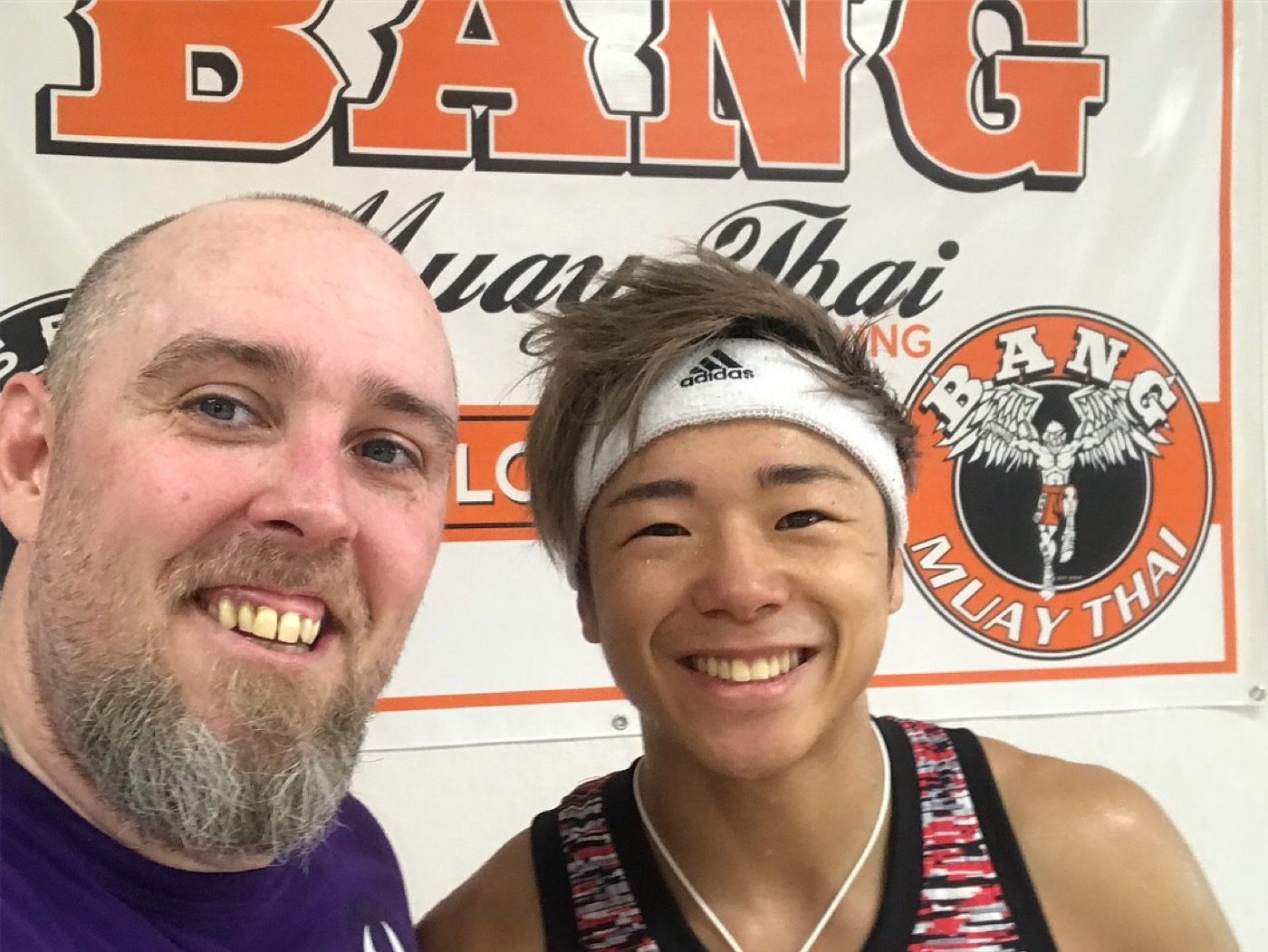 Coach Seth Stacey with a fighter