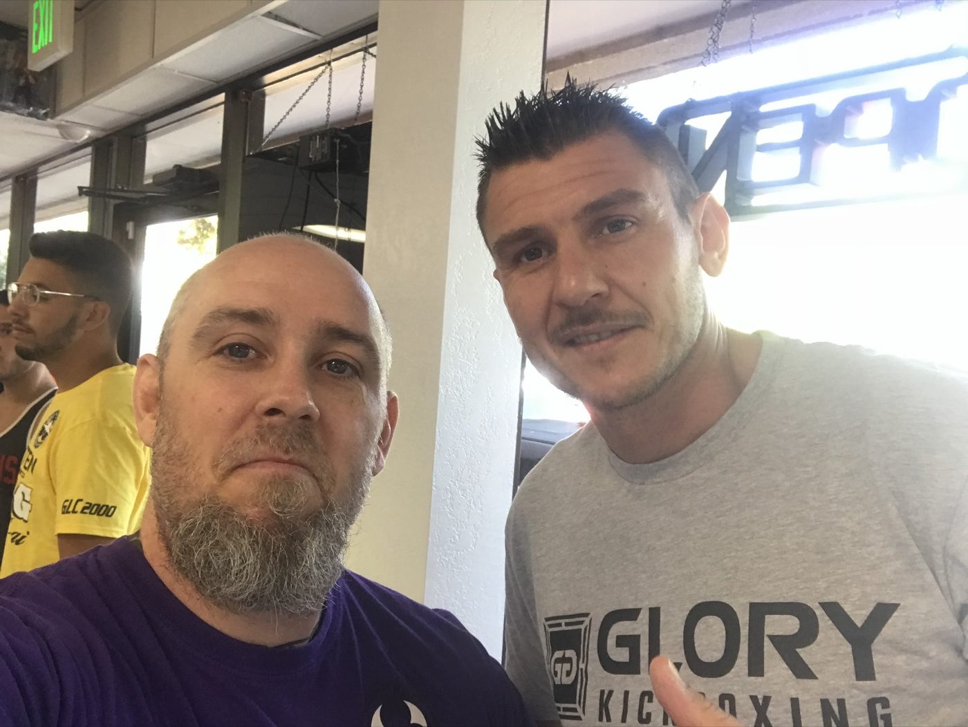 Coach Seth Stacey with a fighter